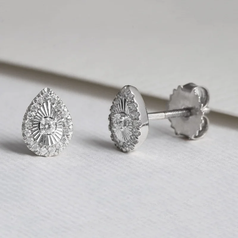 Stud Earrings with Embossed Patterns -1/5ct TDW Diamond Halo Stud Earrings in 10k Gold by De Couer