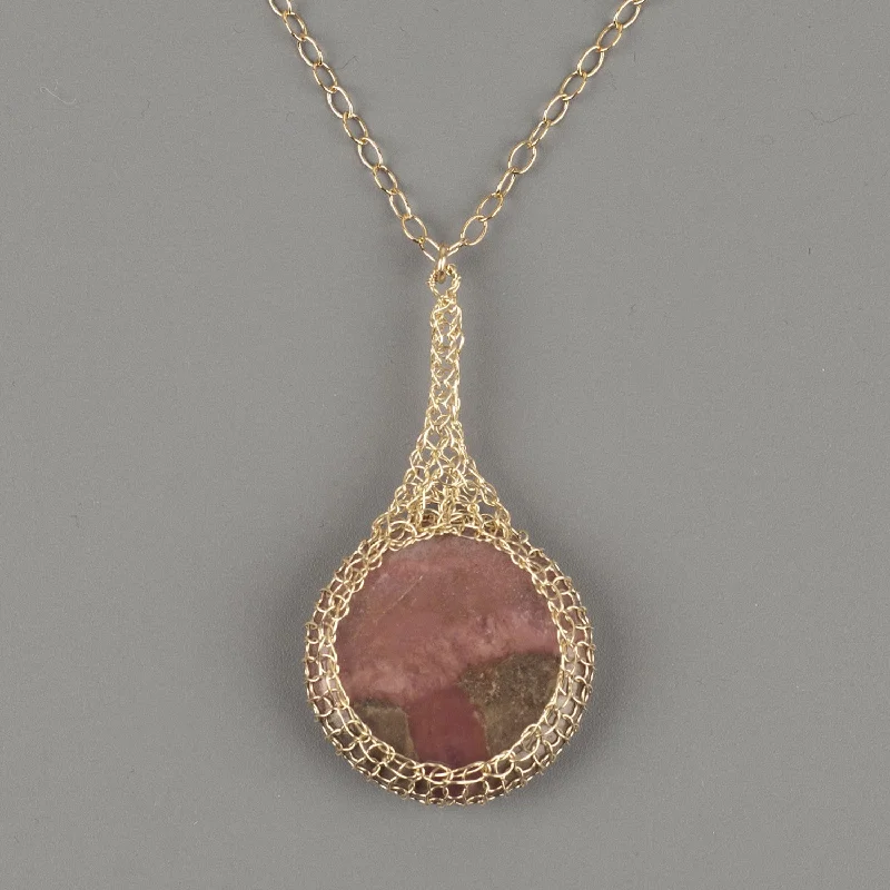 Best necklaces and pendants with silver chains for a sleek, timeless look-Large round Rhodonite pendant necklace, nested in gold wire crochet